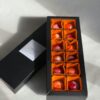 Luxurious selection of chocolates in an elegant box, perfect for gifting and indulgence.